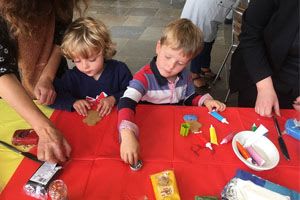 children doing a creative activity at Wheal Martyn