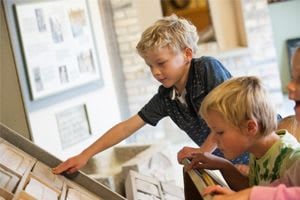 children exploring the discovery centre at Wheal Martyn
