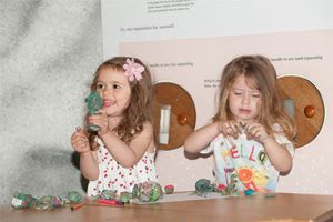 children playing with clay
